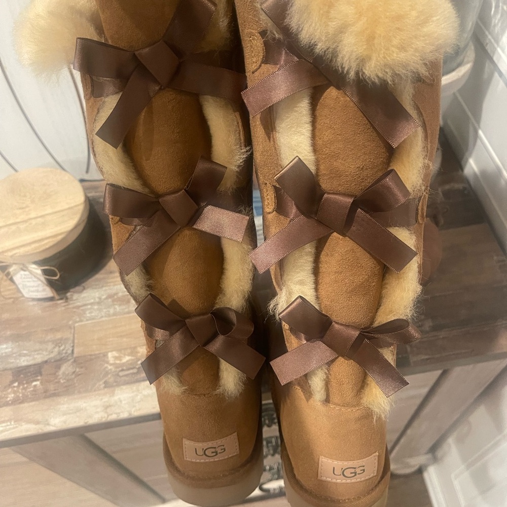 Never worn Bailey bow tie tall boots